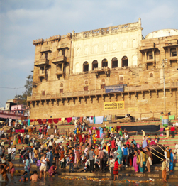 Visit the ghats (steps leading to river Ganga)